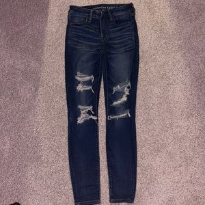 American Eagle dark wash high waisted ripped jeans size 4